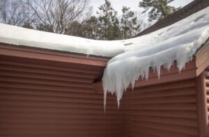 winter storm damage to roof in Montrose